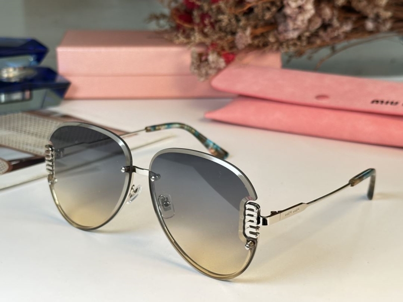 Miu miu Sunglasses